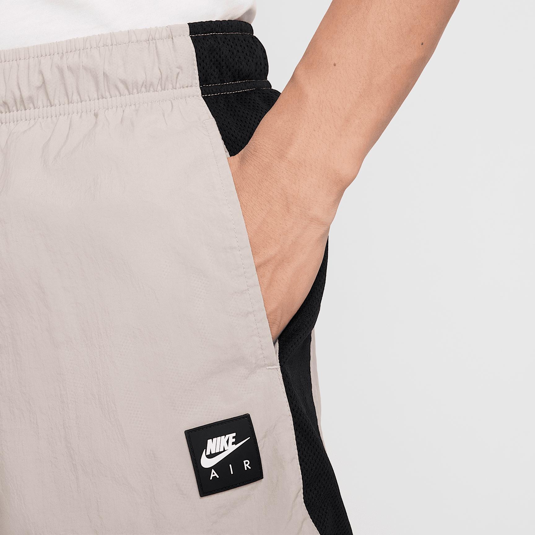 Nike Mens Air Woven Nylon Shorts in College Grey/Black Product Image