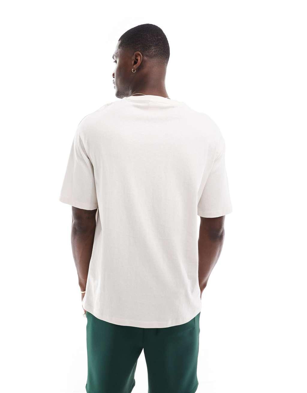 Selected Homme oversized t-shirt with central plant print in cream Product Image
