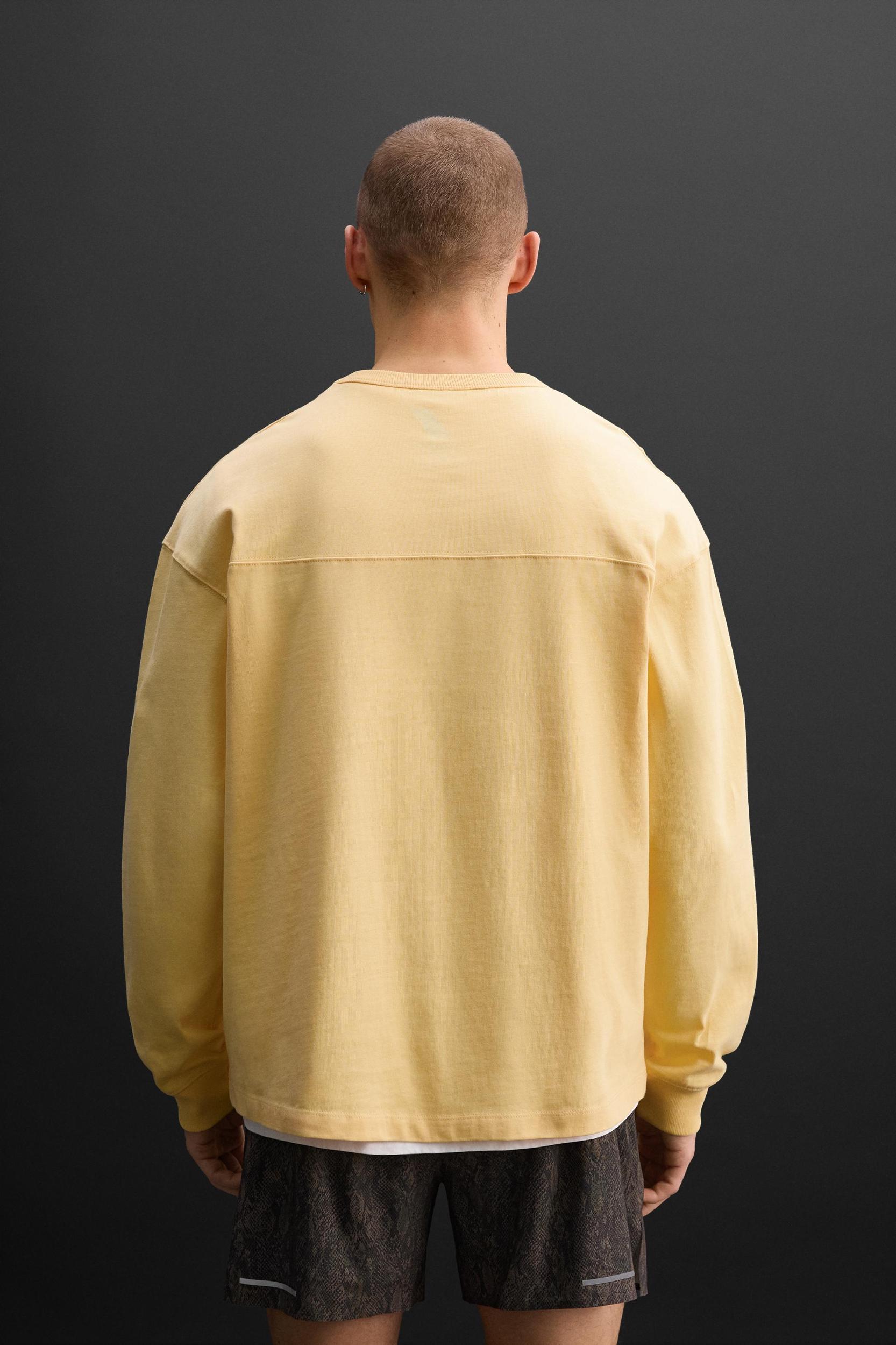 Relaxed fit T-shirt. Round neck and long sleeves with ribbed cuffs. Matching tonal embroidery at front.<br/><br/>Zara Athleticz. Product Image
