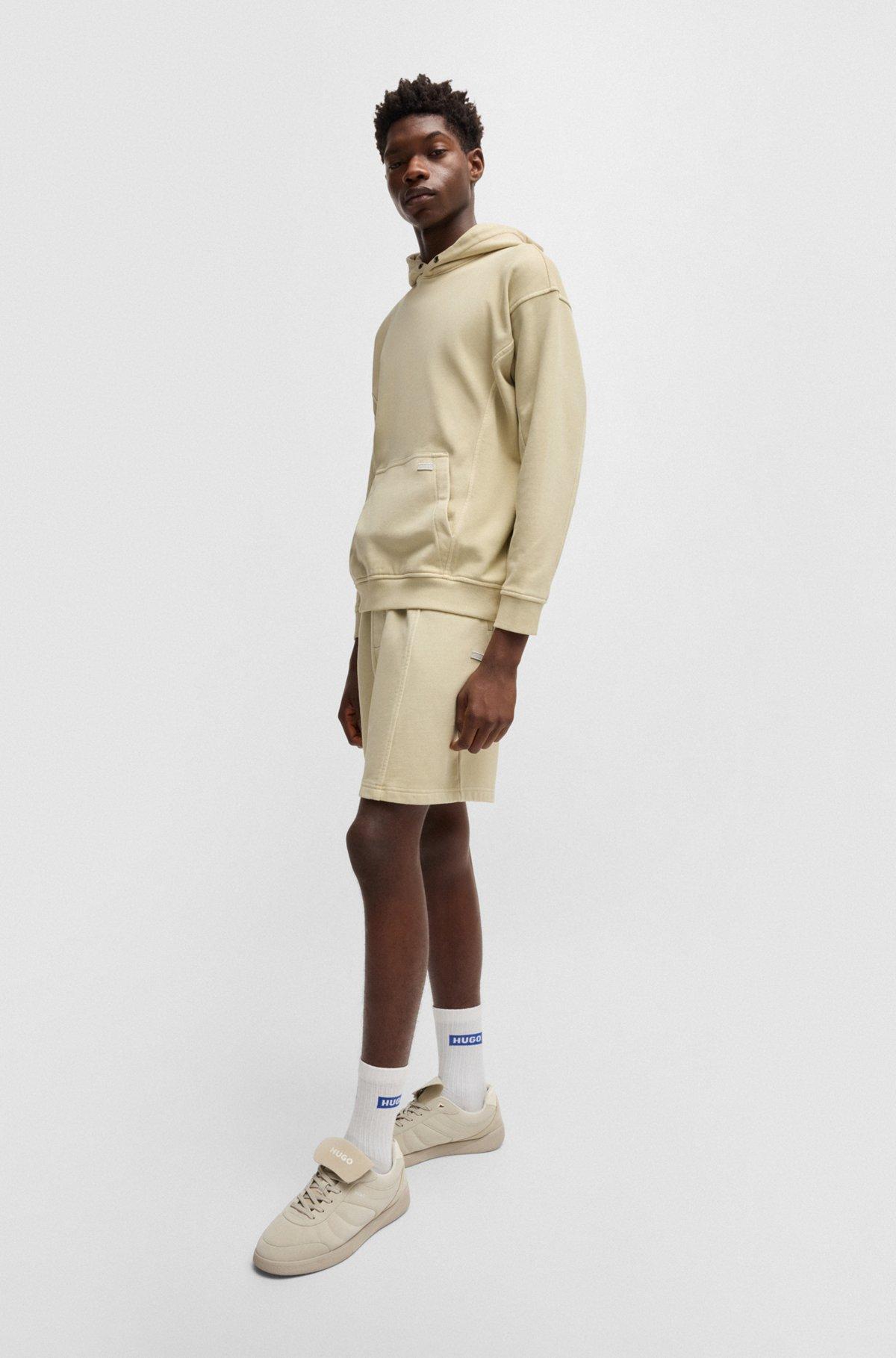 Cotton-terry hoodie with vintage eyelets Product Image