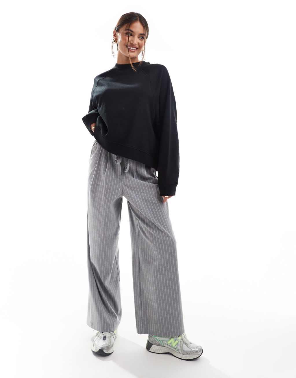 ASOS DESIGN oversized sweat with raglan detail in black Product Image
