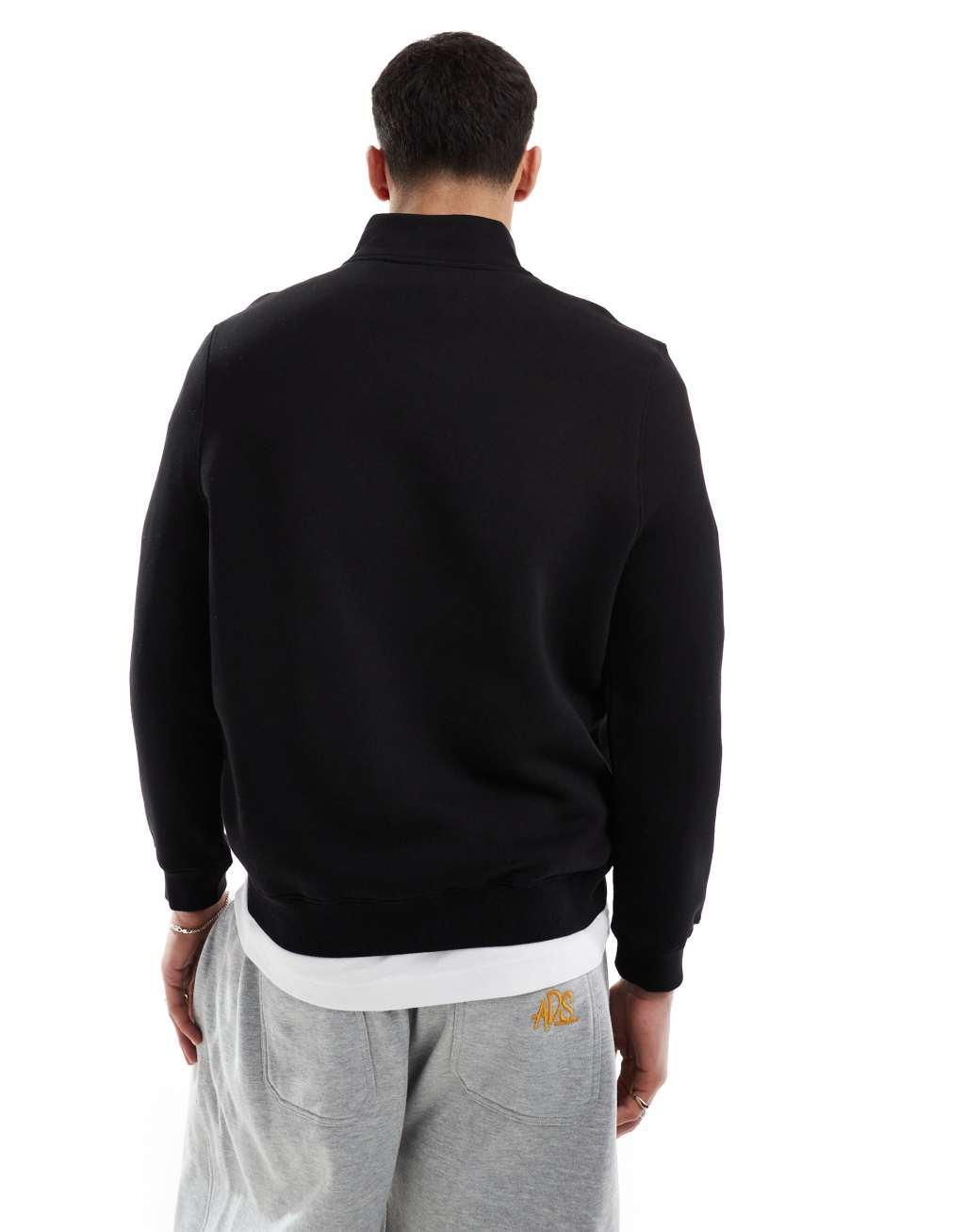 ASOS DESIGN quarter zip sweatshirt in black Product Image