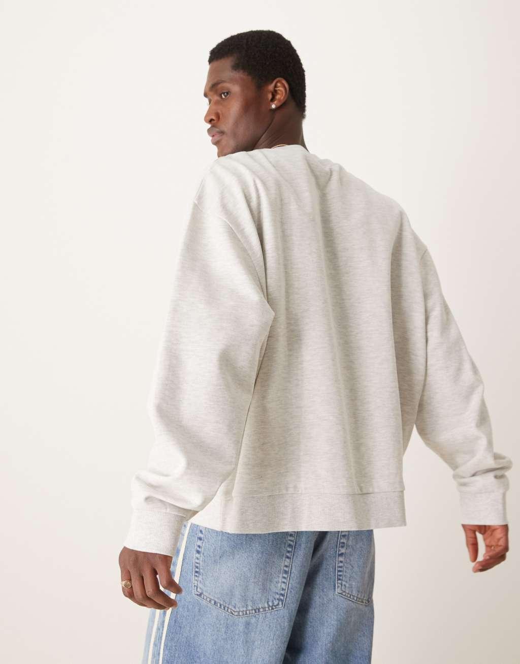 ASOS DESIGN oversized sweatshirt with chest print in white heather Product Image