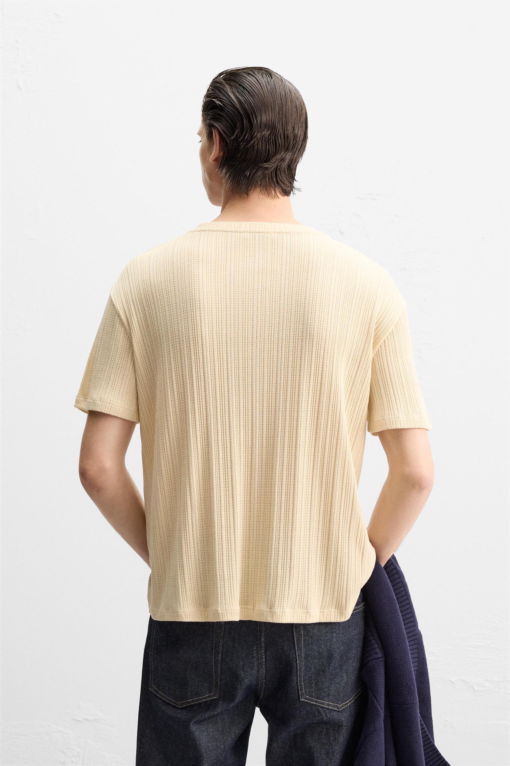 PLEATED BUTTON NECKLINE T-SHIRT Product Image