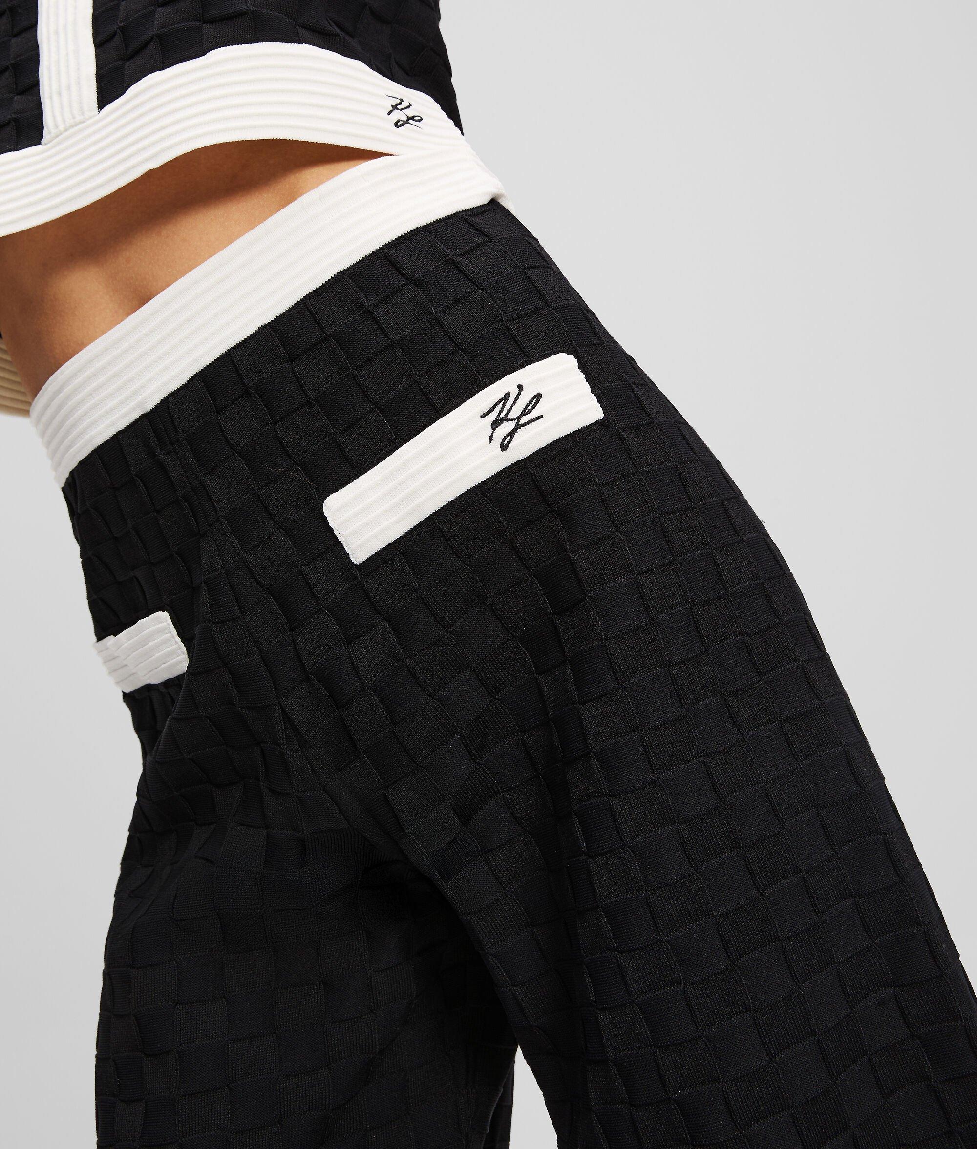 CONTRAST PIPING KNITTED PANTS Product Image
