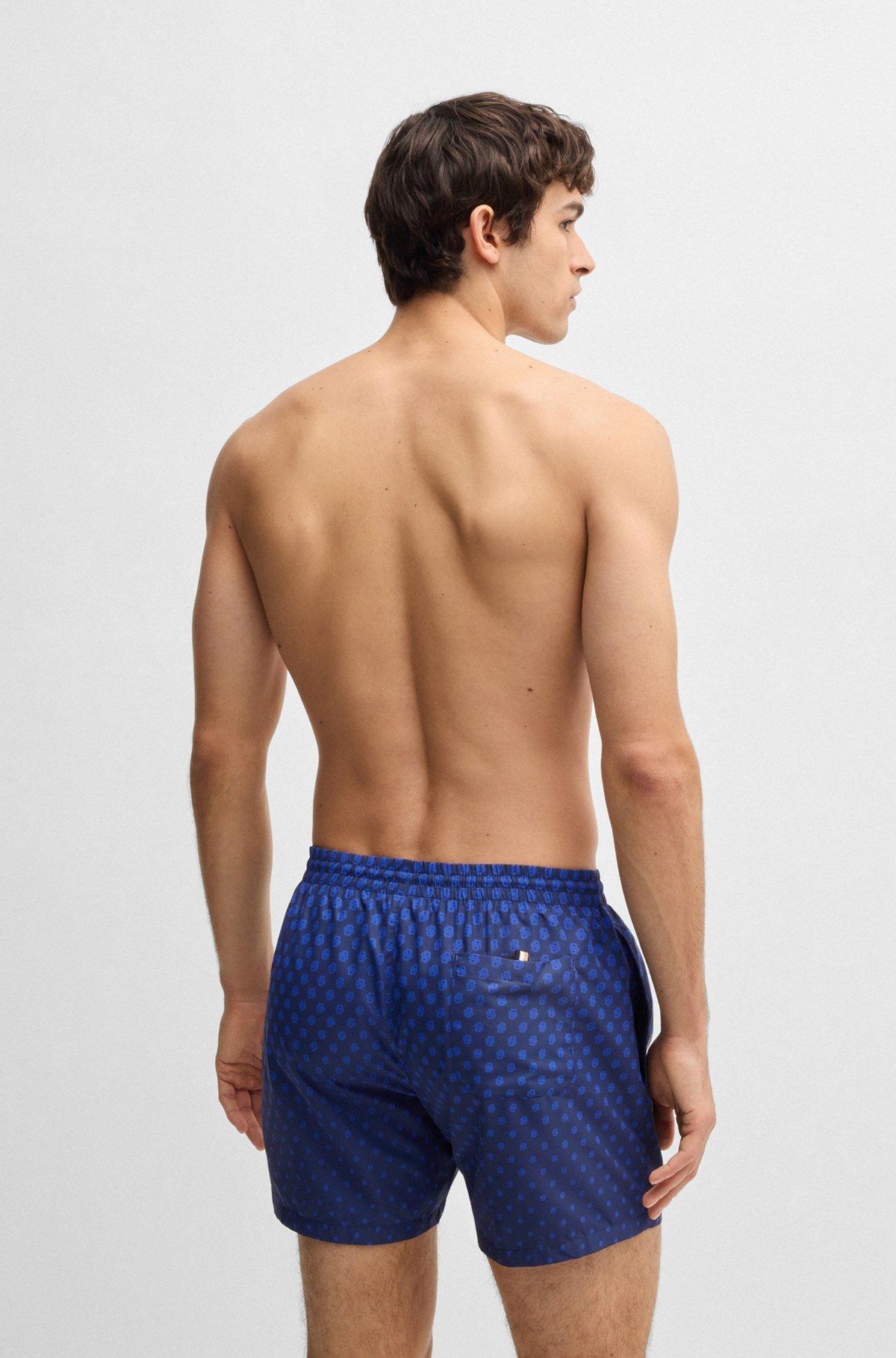Printed swim shorts with logo detail Product Image
