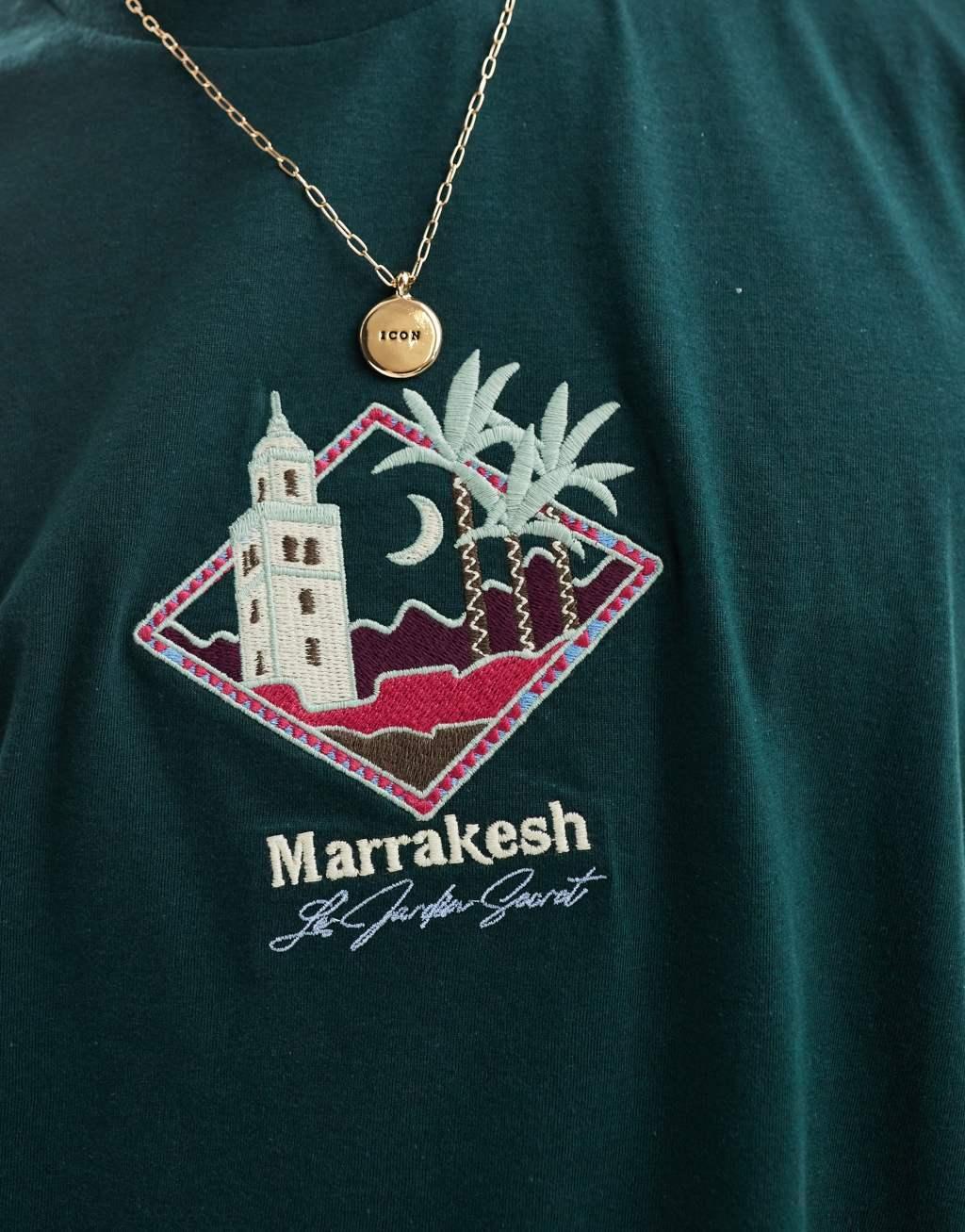 ASOS DESIGN oversized tank top with Marrakesh city chest print Product Image