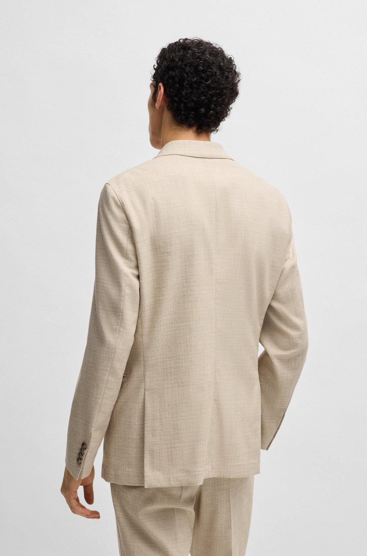 Two-piece suit in patterned tweed Product Image
