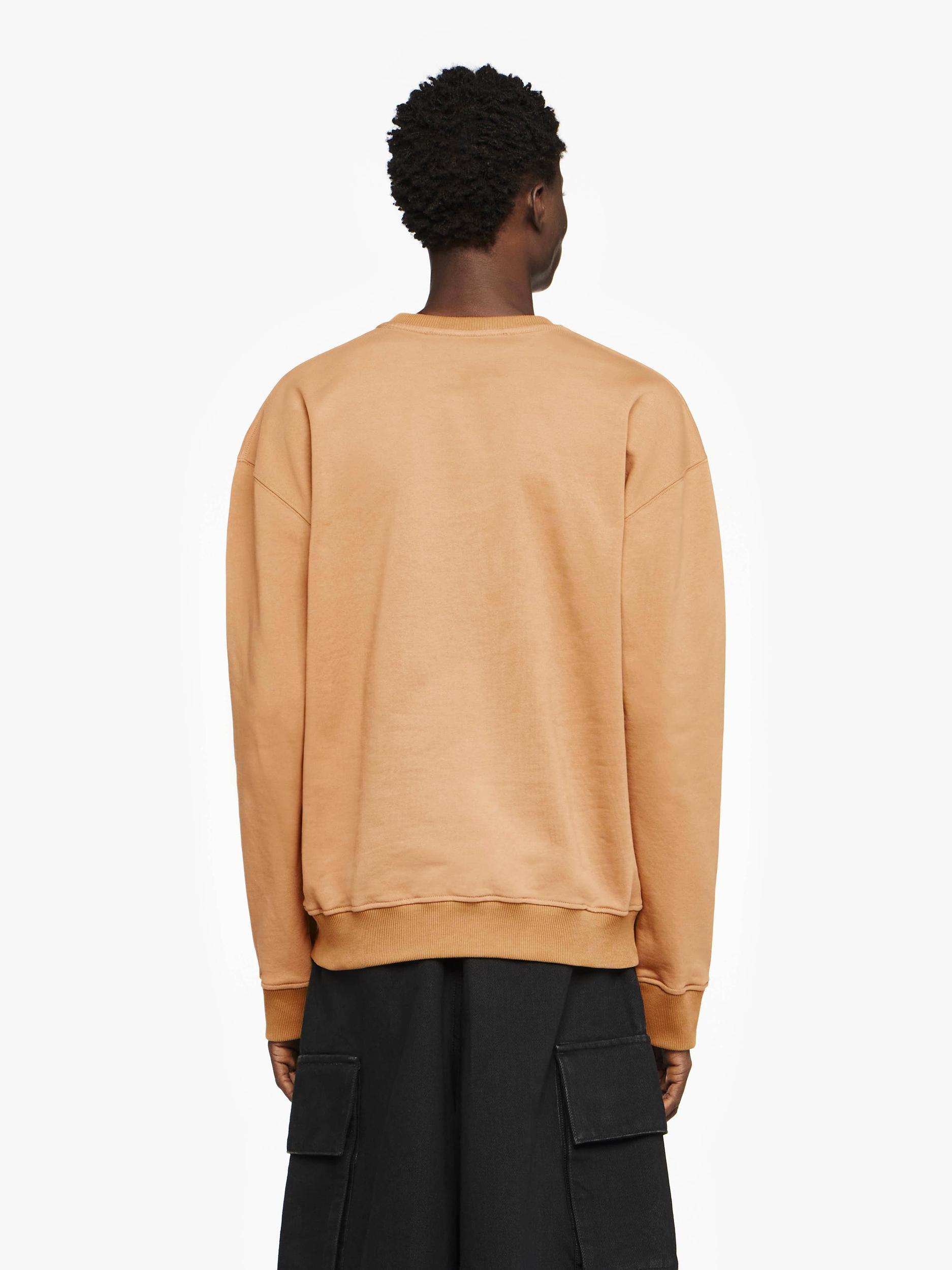 SWEATSHIRT WITH PRINTED LACE FRONTPANEL Product Image