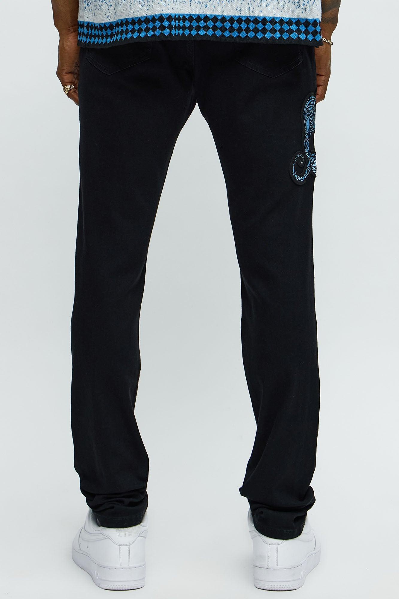 Side Snake Rip And Repair Stacked Skinny Jeans - Black Product Image