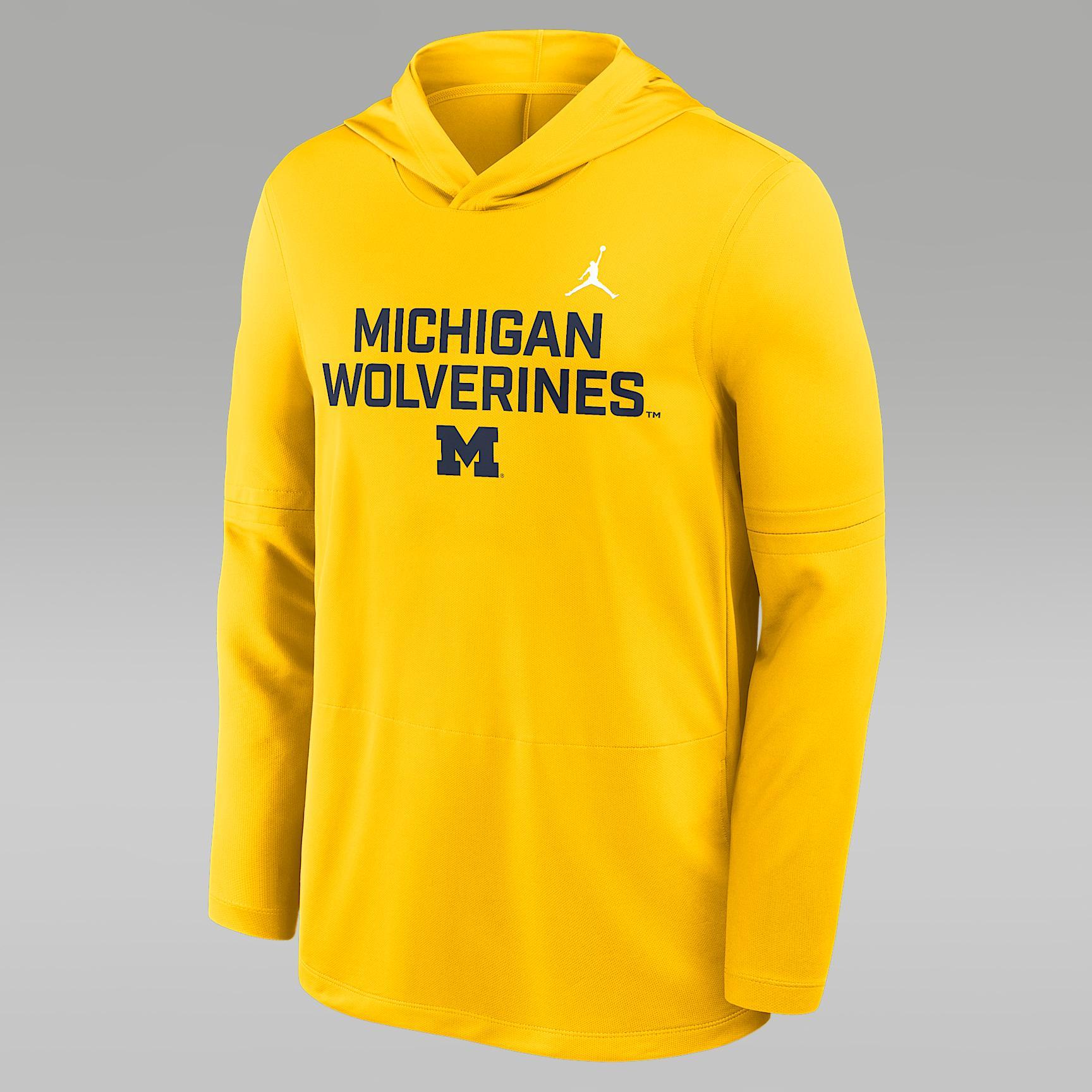 Michigan Sideline Men's Jordan Brand Dri-FIT College Long-Sleeve Hooded Top Product Image