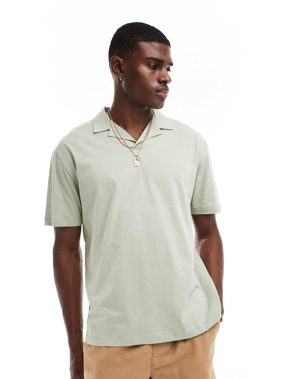 ASOS DESIGN oversized polo with back print in light green Product Image