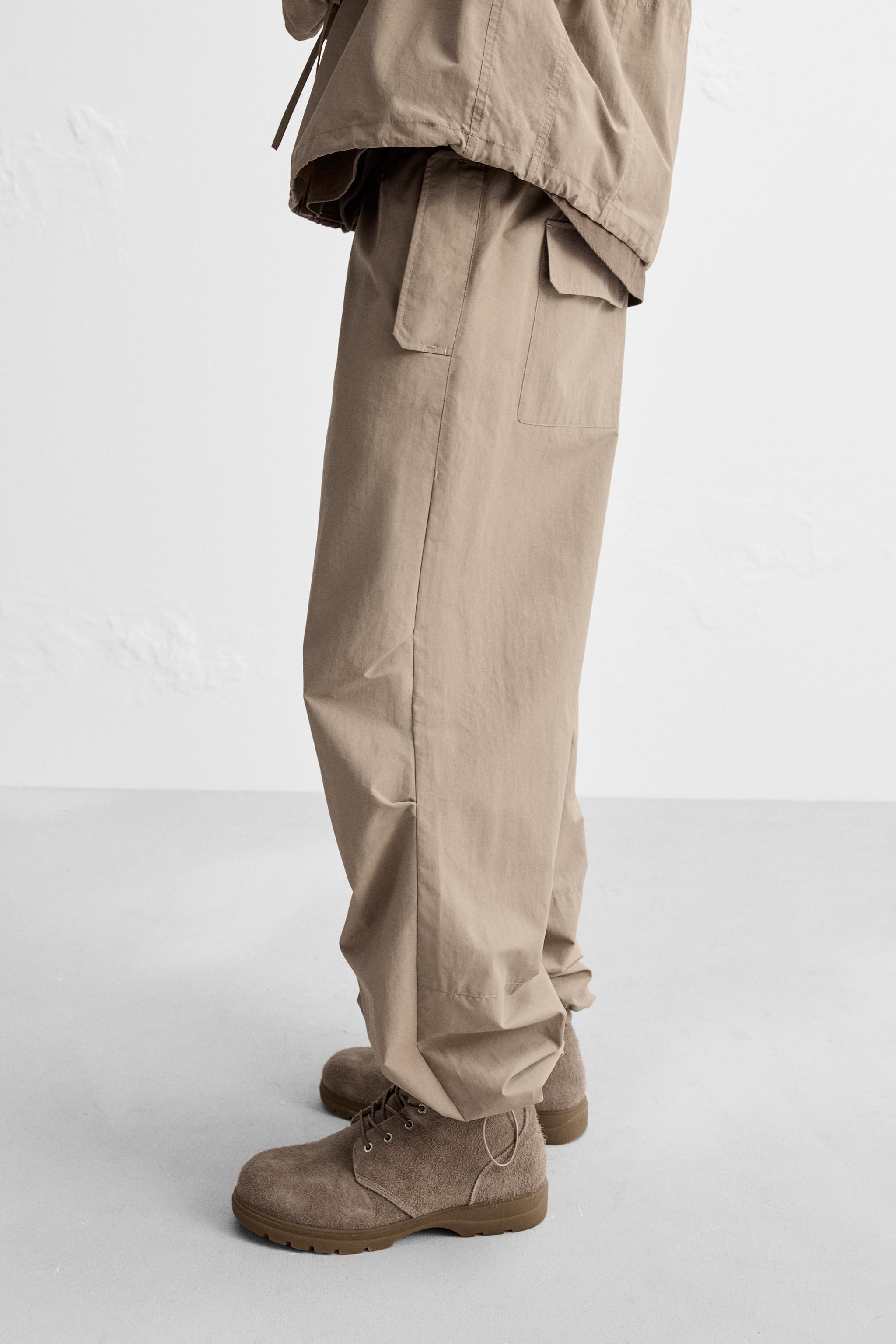 TECHNICAL WATER REPELLENT PARACHUTE PANTS Product Image