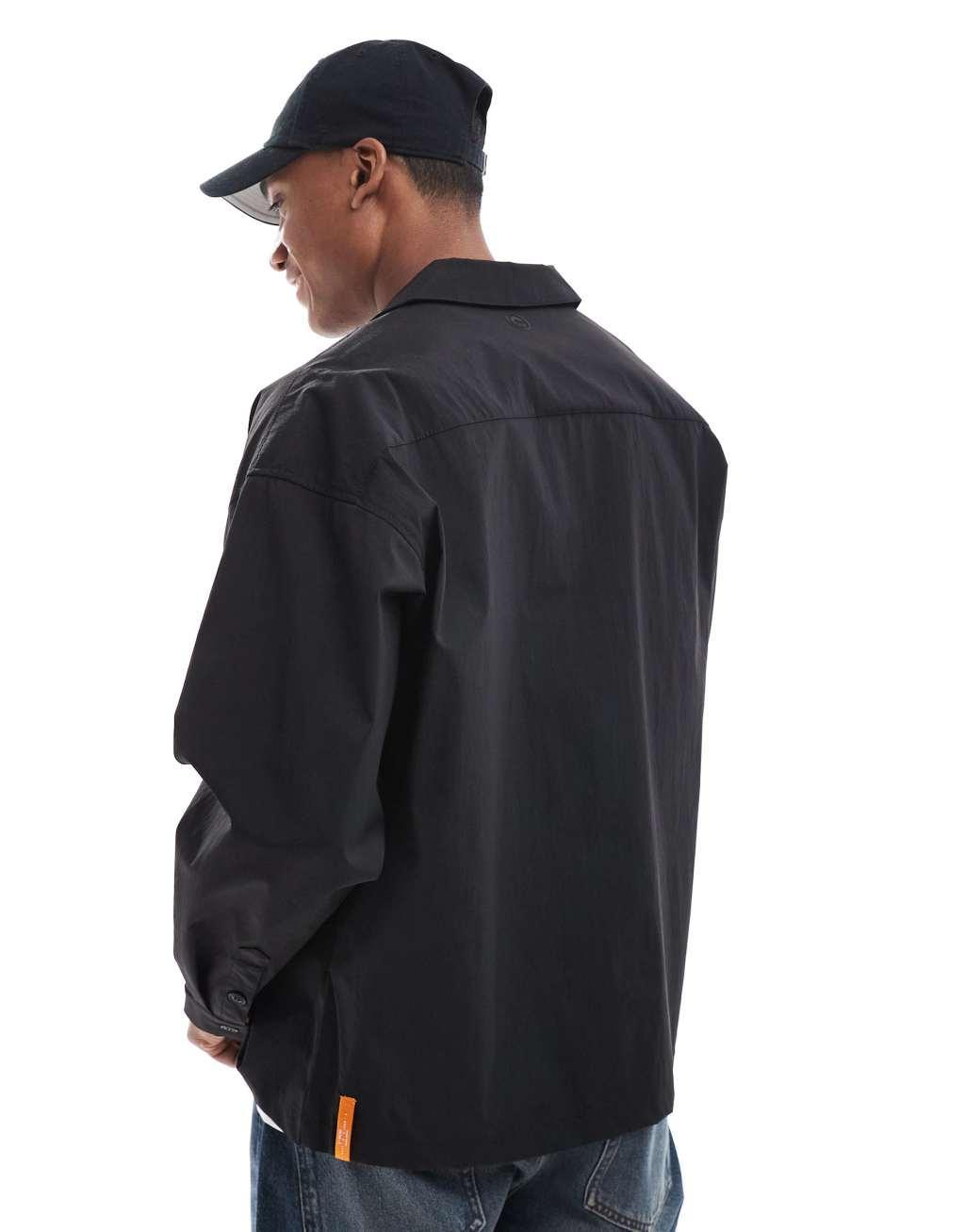 Jack & Jones oversized nylon overshirt in black Product Image