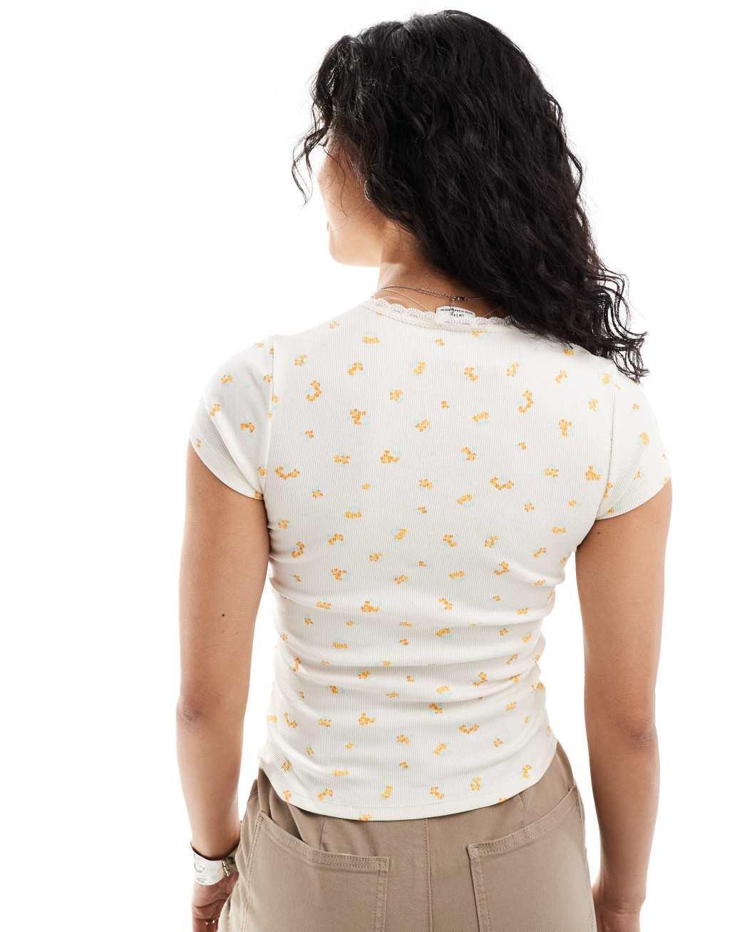 Cotton On fitted cropped t-shirt with v neck rosette detail in retro floral  Product Image