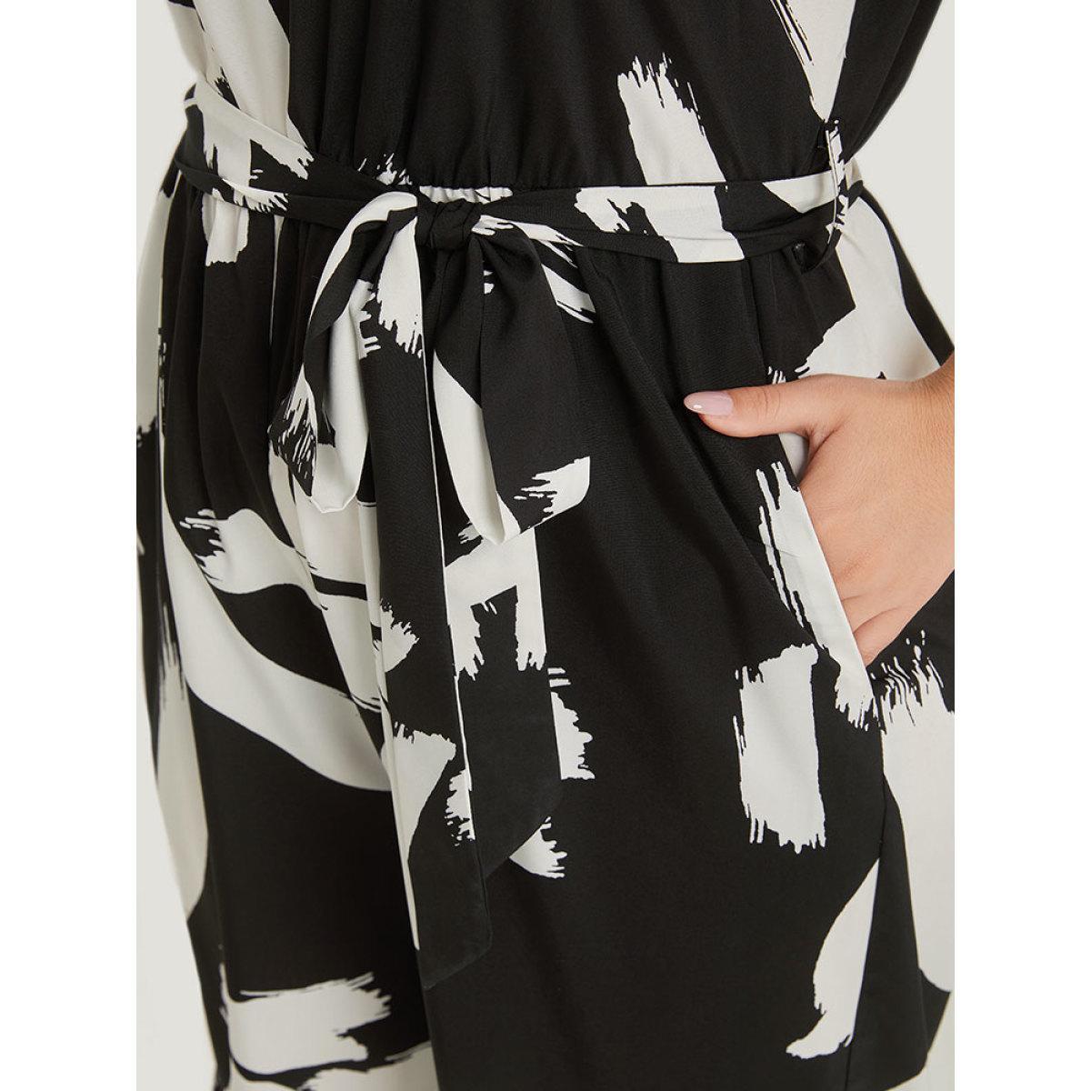 Plus Size BlackFlower Brush Print Notched Pocket Sleeveless Belted Jumpsuit Women Elegant Sleeveless Notched collar Dailywear Loose Jumpsuits BloomChic 26/4X Product Image