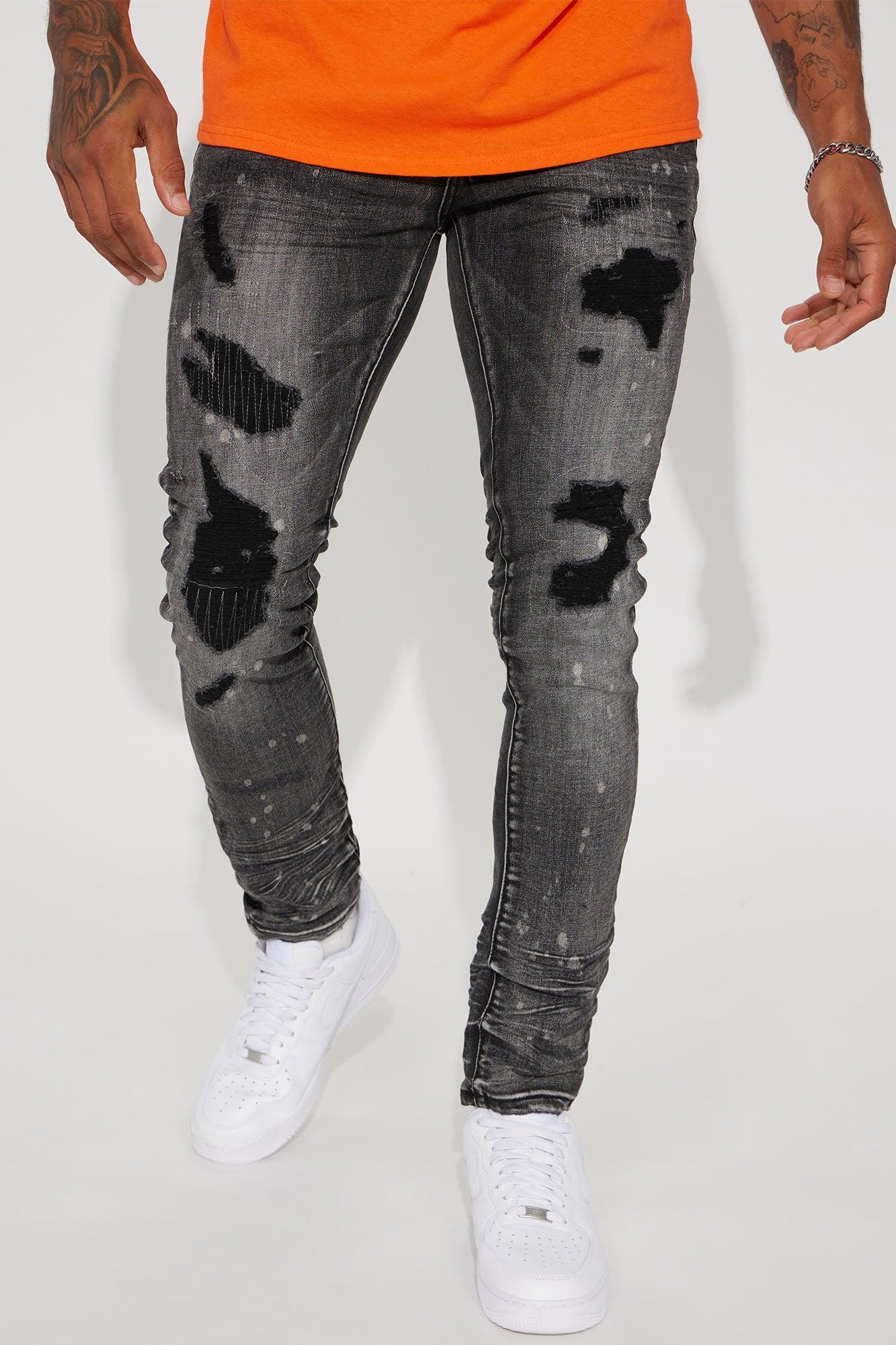 On The Spot Ripped Stacked Skinny Jeans - Black Product Image