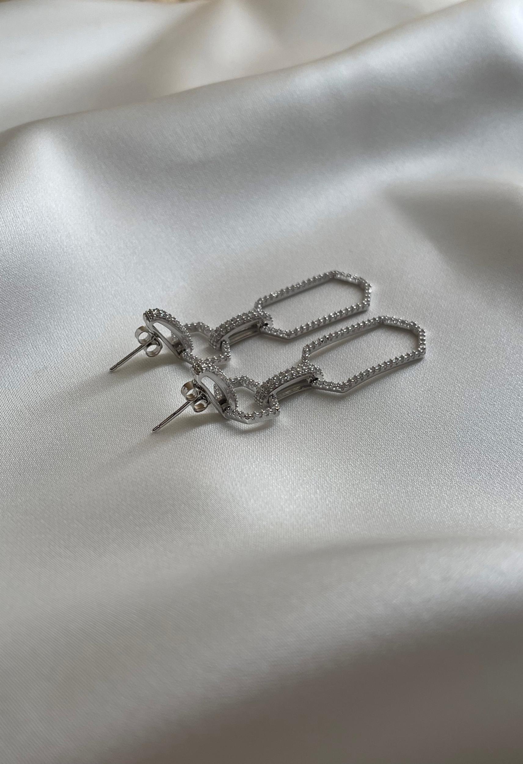 Silver Dangle Crystal Linked Earrings Product Image