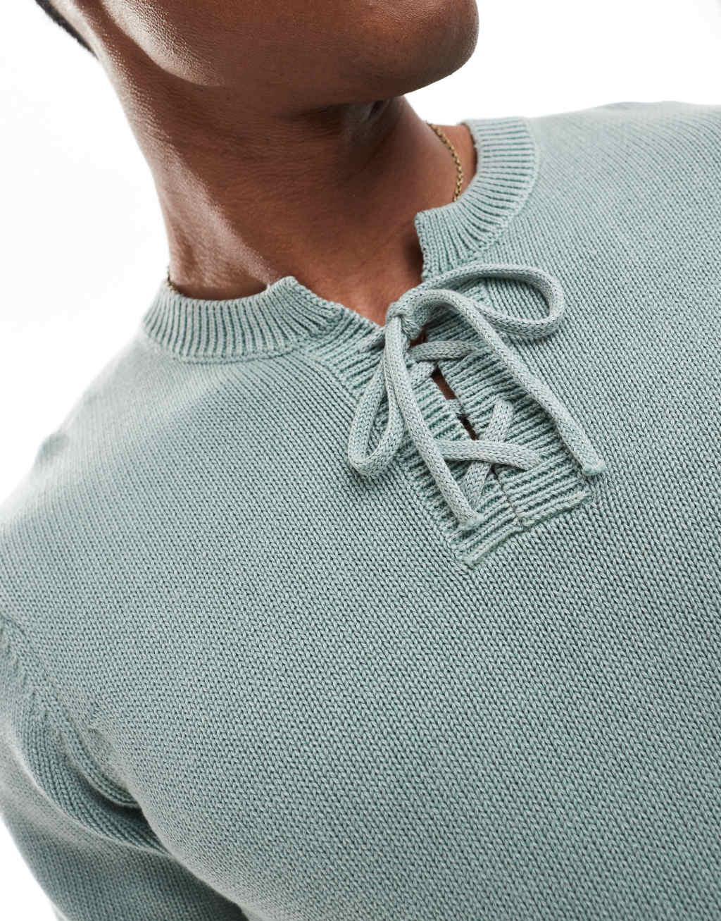 ASOS DESIGN washed knitted t-shirt in blue with lace up detail Product Image