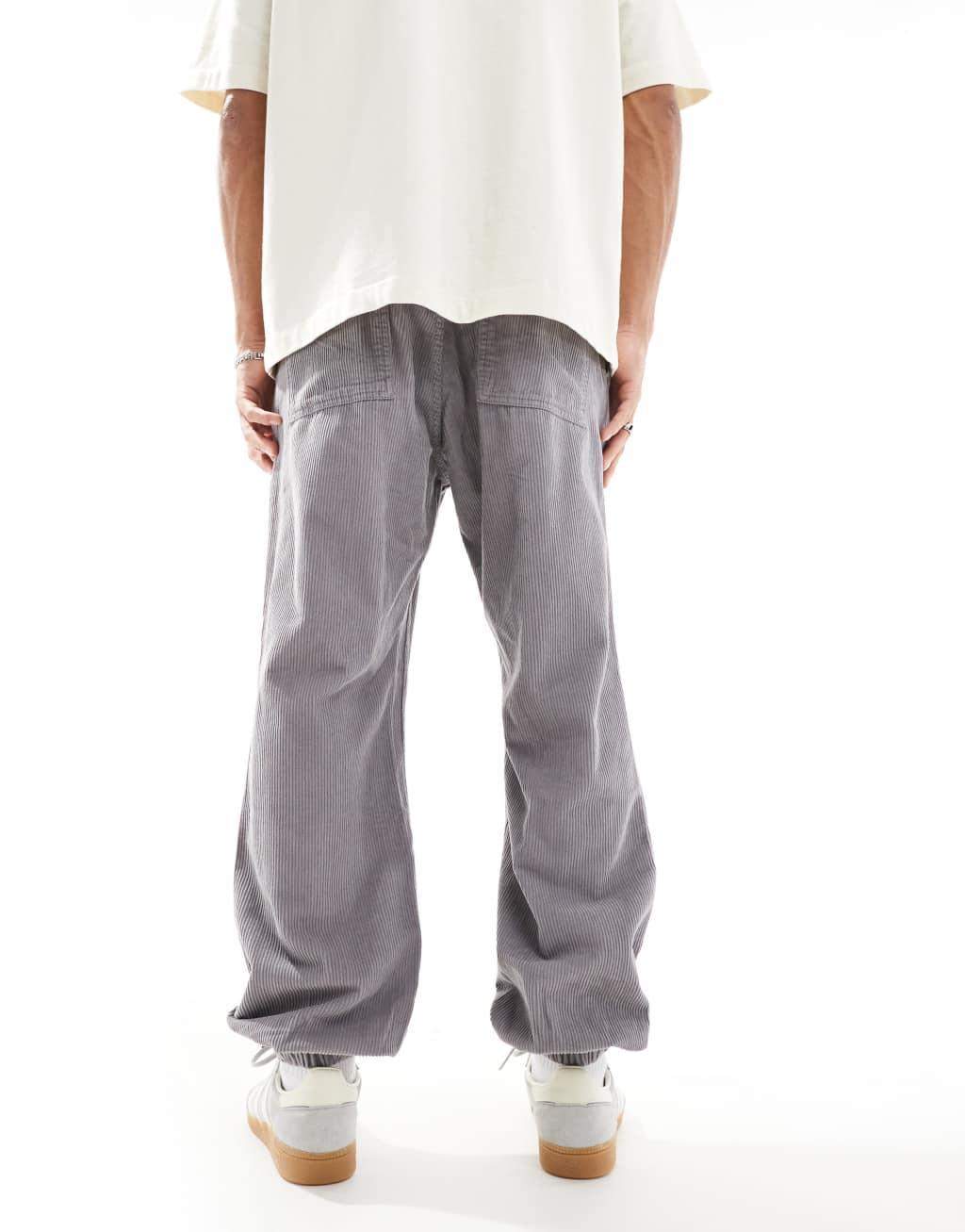 ASOS DESIGN tapered washed cord sweatpants in gray Product Image