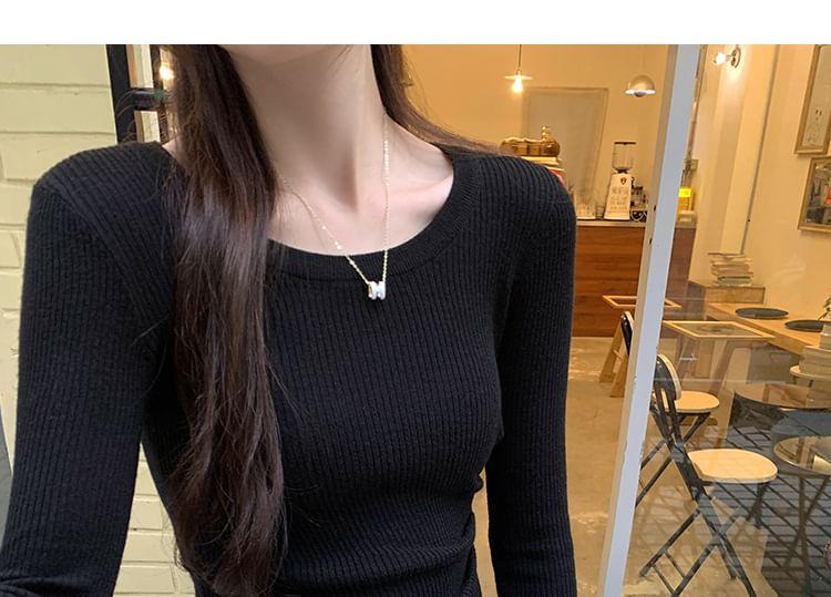 Long-Sleeve Crewneck Asymmetrical Plain Knit Top Product Image
