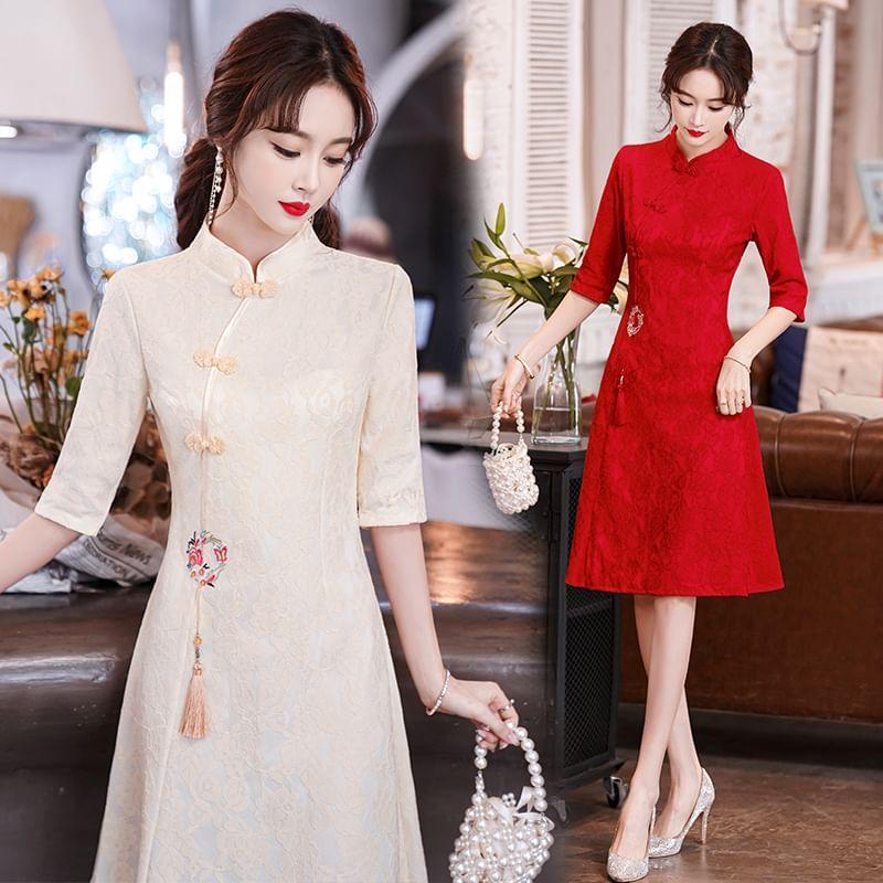 Traditional Chinese 3/4-Sleeve Stand Collar Floral Embroidered Tassel Frog Buttoned A-Line Dress Product Image