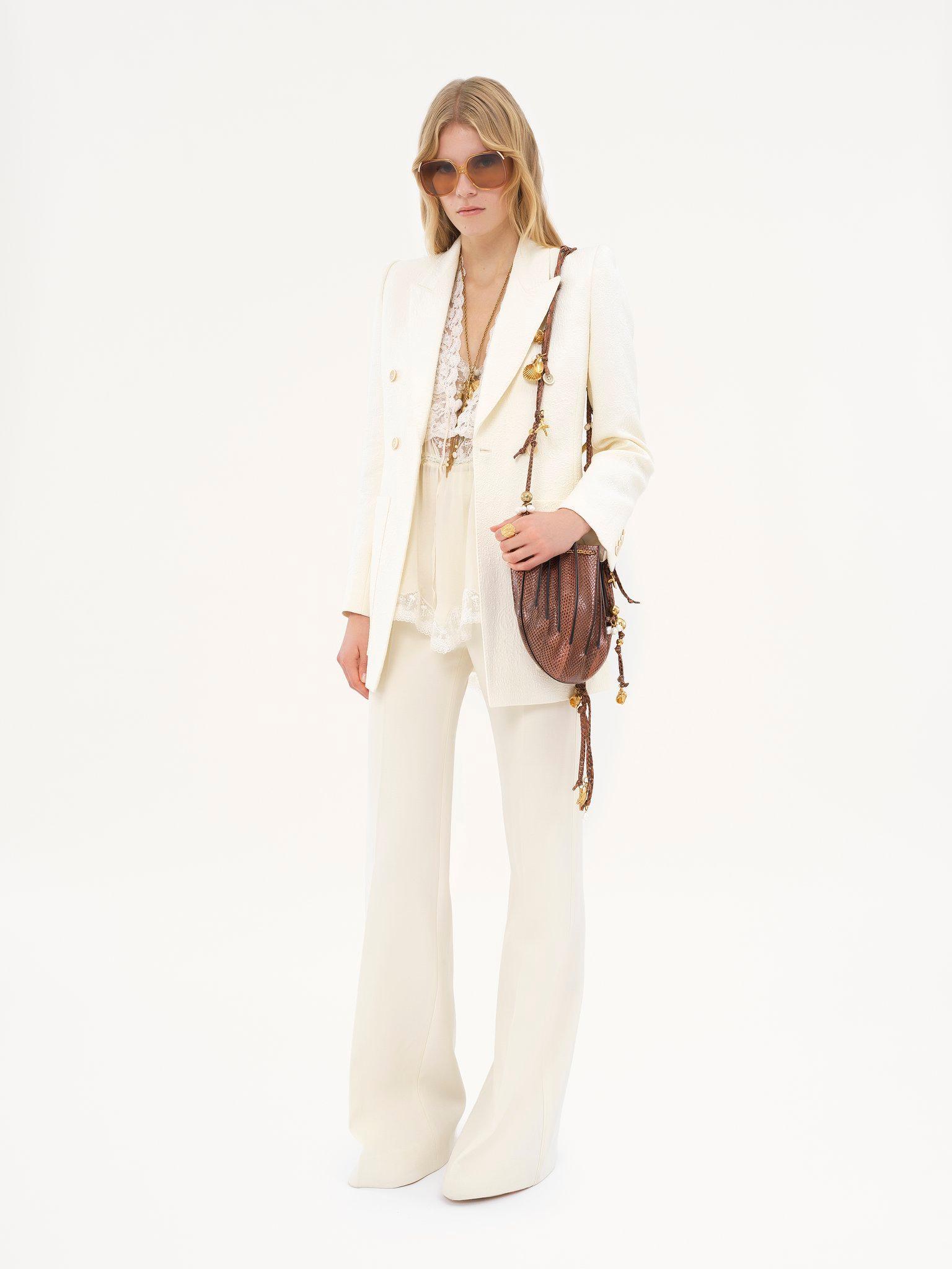 High-rise flared pants in wool grain de poudre Product Image