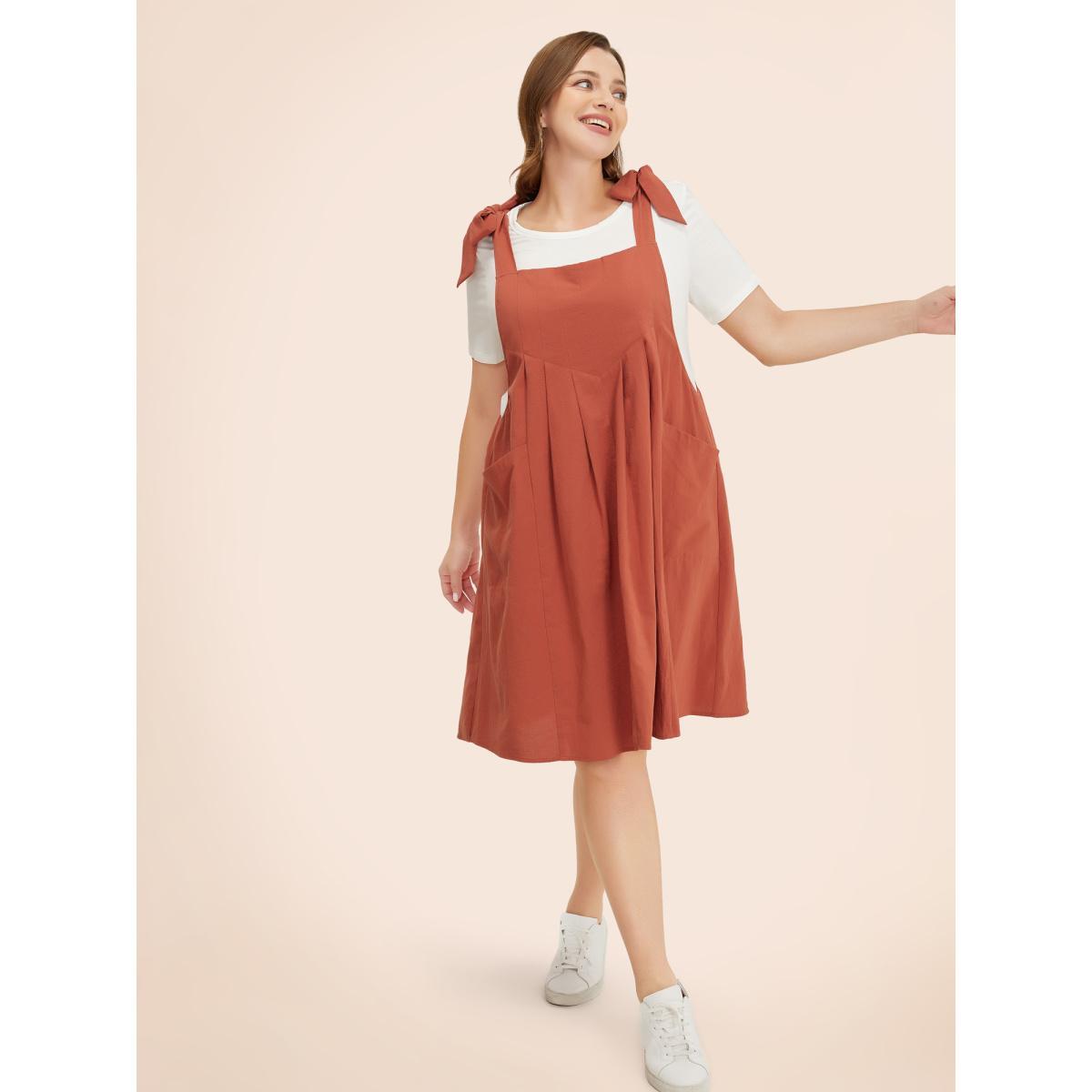Plus Size Solid Pleated Hem Pocket Tie Shoulder Overall Dress Rust Women Casual Pleated Spaghetti Strap Sleeveless Curvy Knee Dress BloomChic 26/4X Product Image