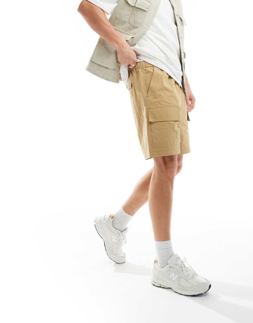 ASOS DESIGN cargo nylon shorts in beige Product Image