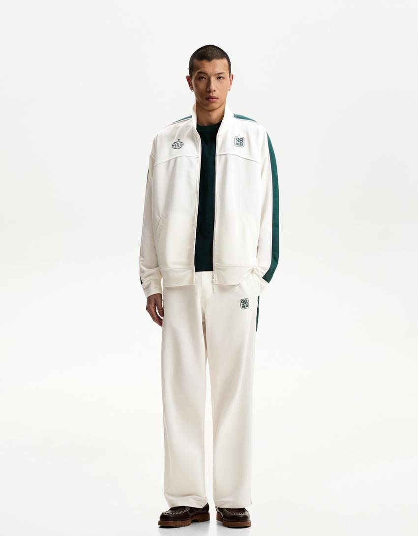 Embroidered technical pants Product Image