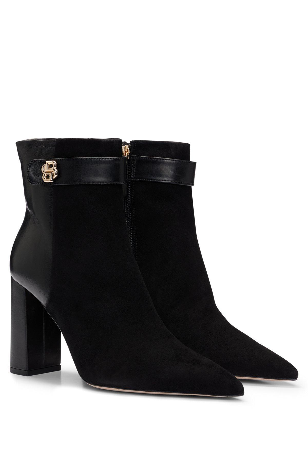 Block-heel ankle boots in suede and leather Product Image