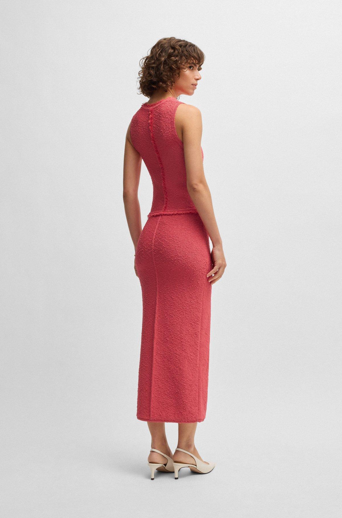 Sleeveless knitted dress with fringe trims Product Image
