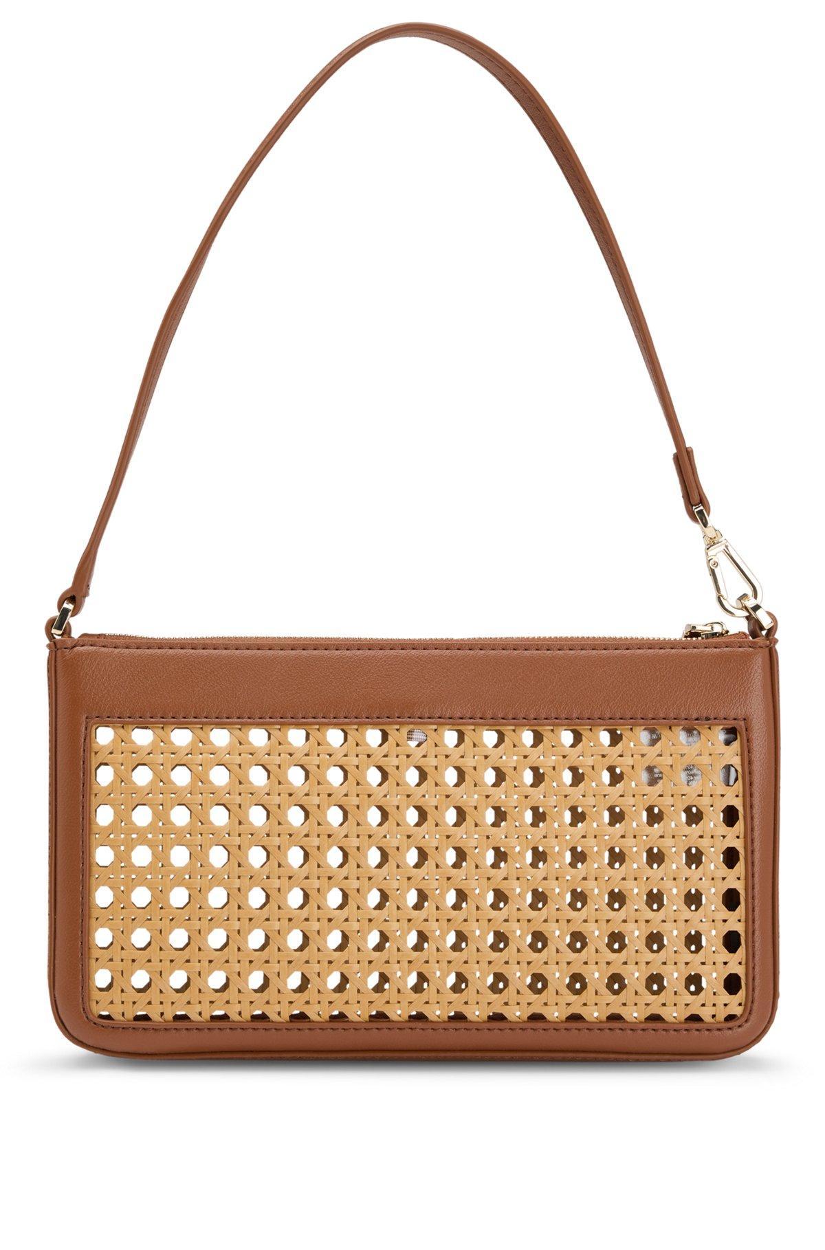 Woven shoulder bag with partially detachable handle Product Image