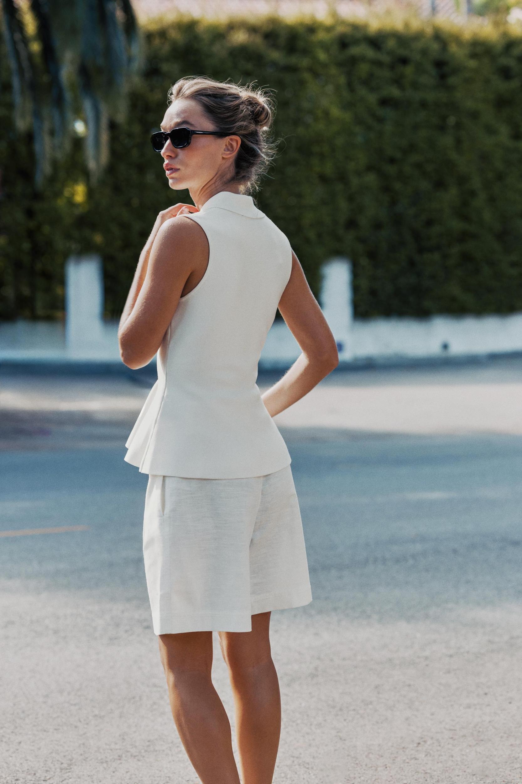 PEPLUM KNIT VEST TOP Product Image