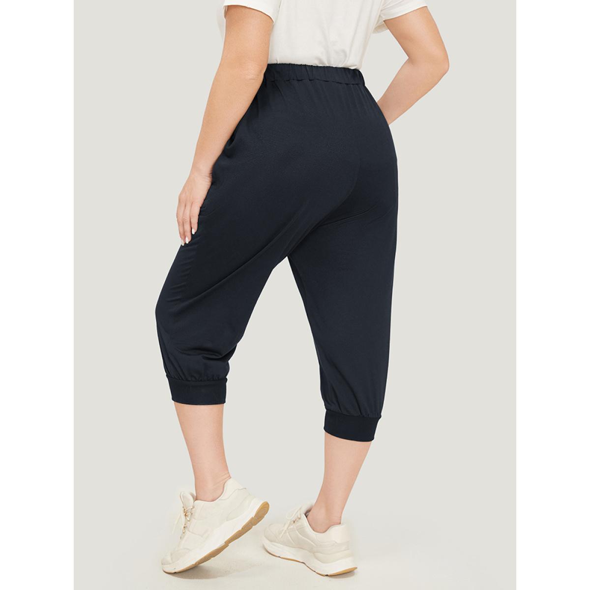 Plus Size Solid Knot Front Pocket Carrot Pants Women Indigo Casual High Rise Dailywear Pants BloomChic 30/6X Product Image