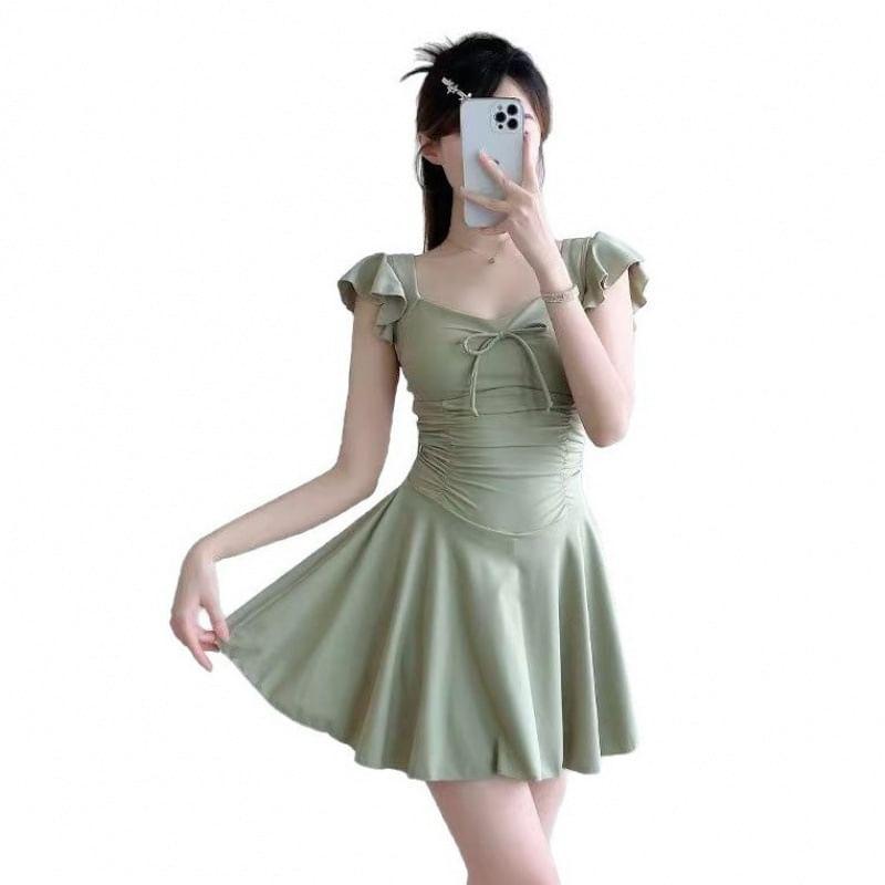 Cap-Sleeve V-Neck Plain Bow Accent Ruched Swim Dress Product Image