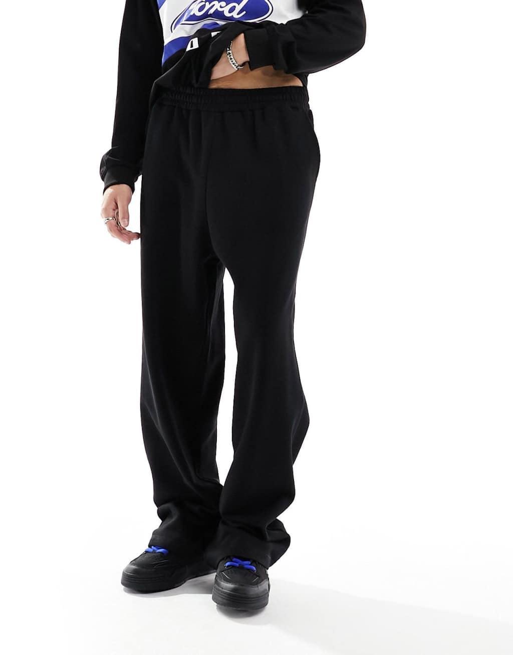 COLLUSION relaxed sweatpants in black Product Image