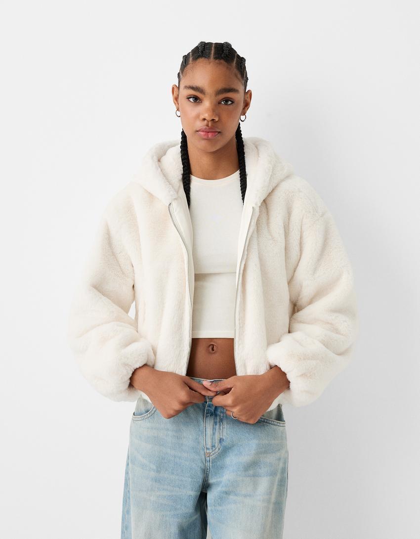 Quilted jacket with faux fur hood Product Image