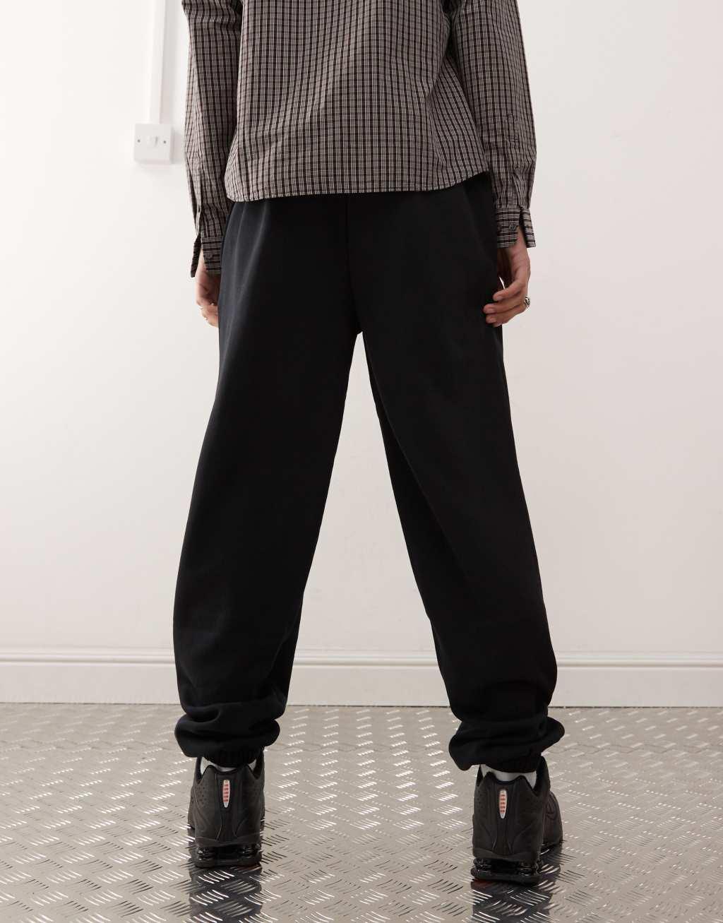 COLLUSION sweatpants in black Product Image
