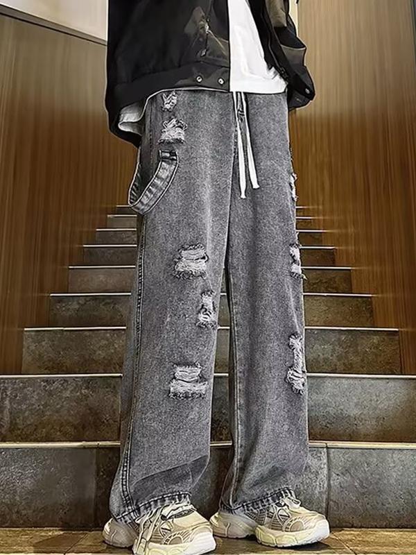 Men's Vintage Cross Embroidery Ripped Loose Jeans Product Image