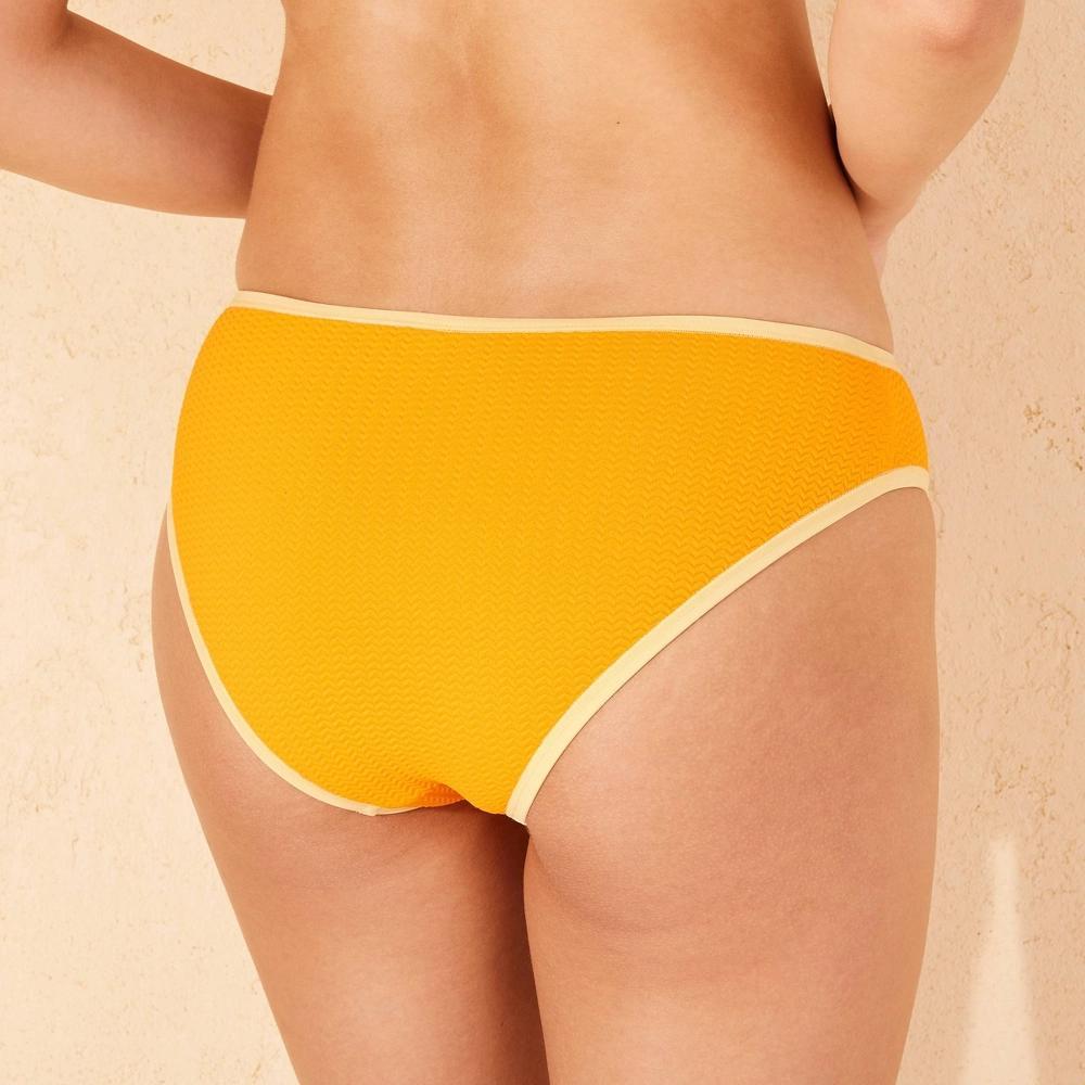 Women's Pucker Textured Contrast Binding Low-Rise Medium Coverage Bikini Bottom - Wild Fable™ Orange/Yellow M: Recycled Polyester Lining Product Image