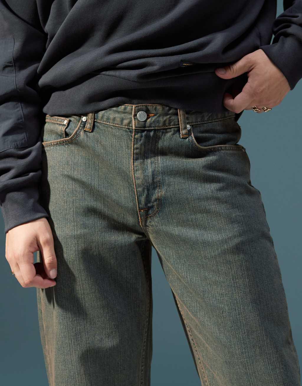 ASOS DESIGN wide flare jeans in light wash with tint Product Image