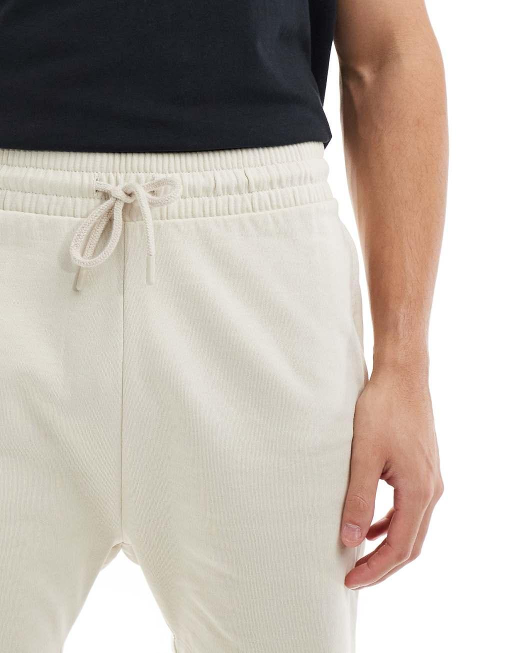 ASOS DESIGN skinny shorts in beige  Product Image