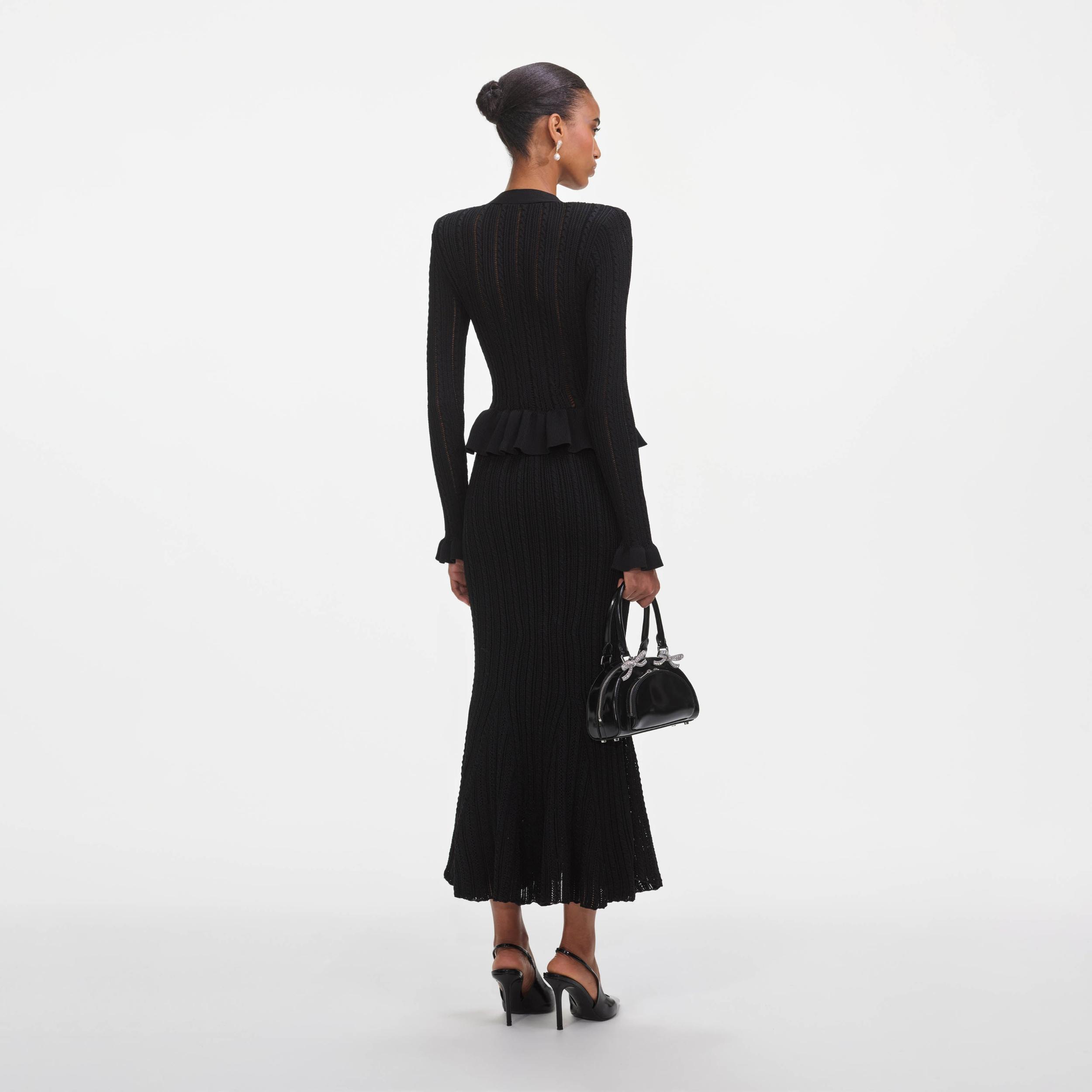 Black Knit Peplum Midi Dress Product Image