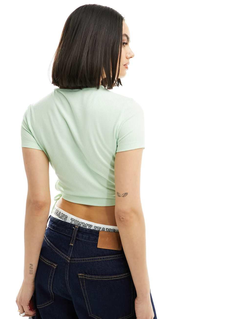 Tommy Jeans cropped ribbed top in green Product Image