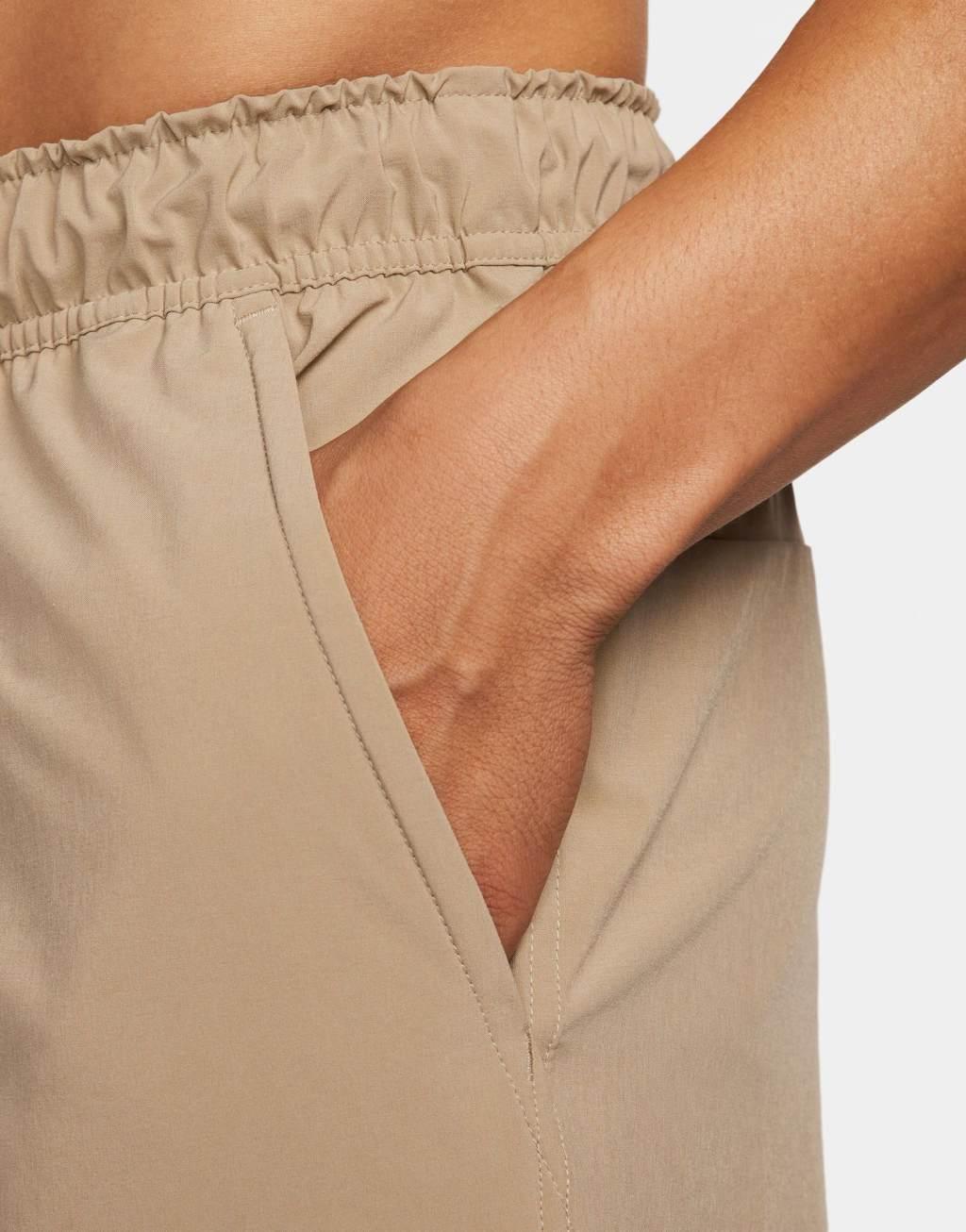 Nike Training Dri-FIT Unlimited woven 7inch shorts in beige Product Image
