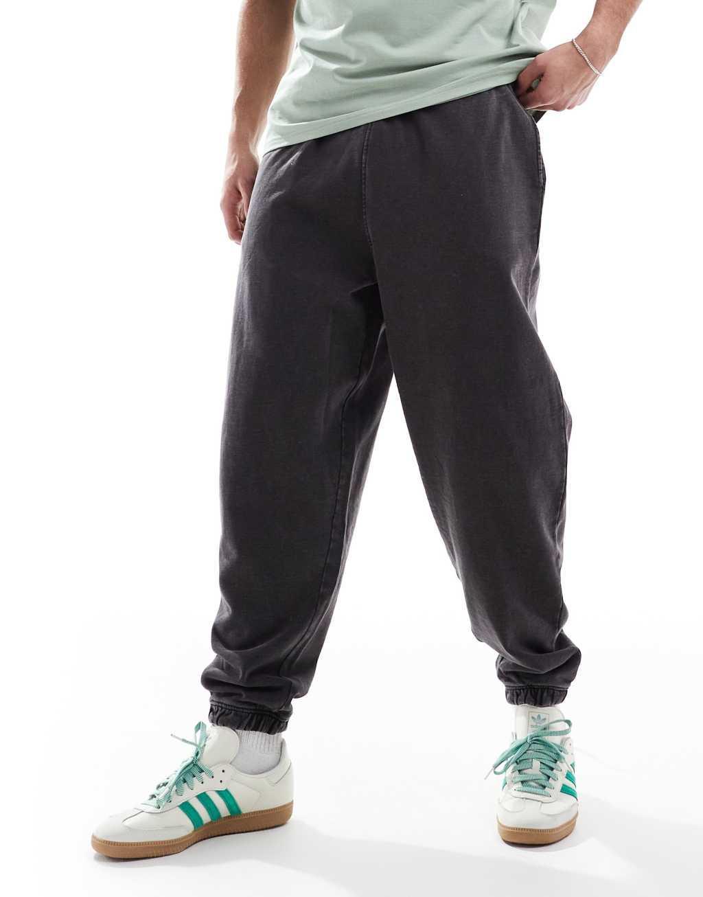 ASOS DESIGN oversized sweatpants in washed deep navy Product Image