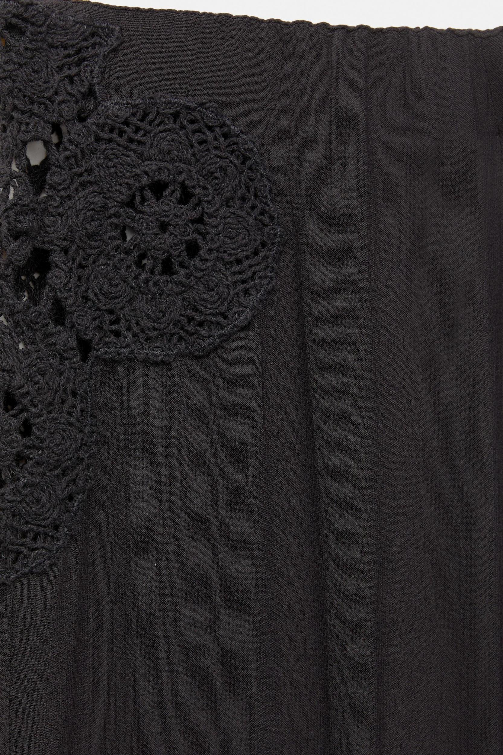 Rustic crochet embroidered trousers Product Image
