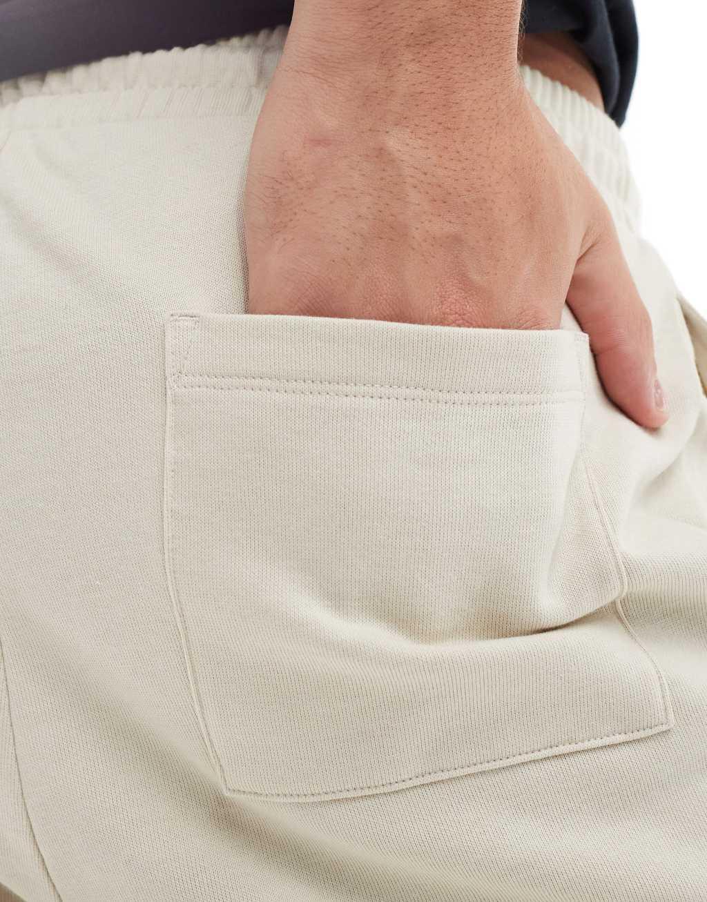 ASOS DESIGN skinny shorts in beige  Product Image