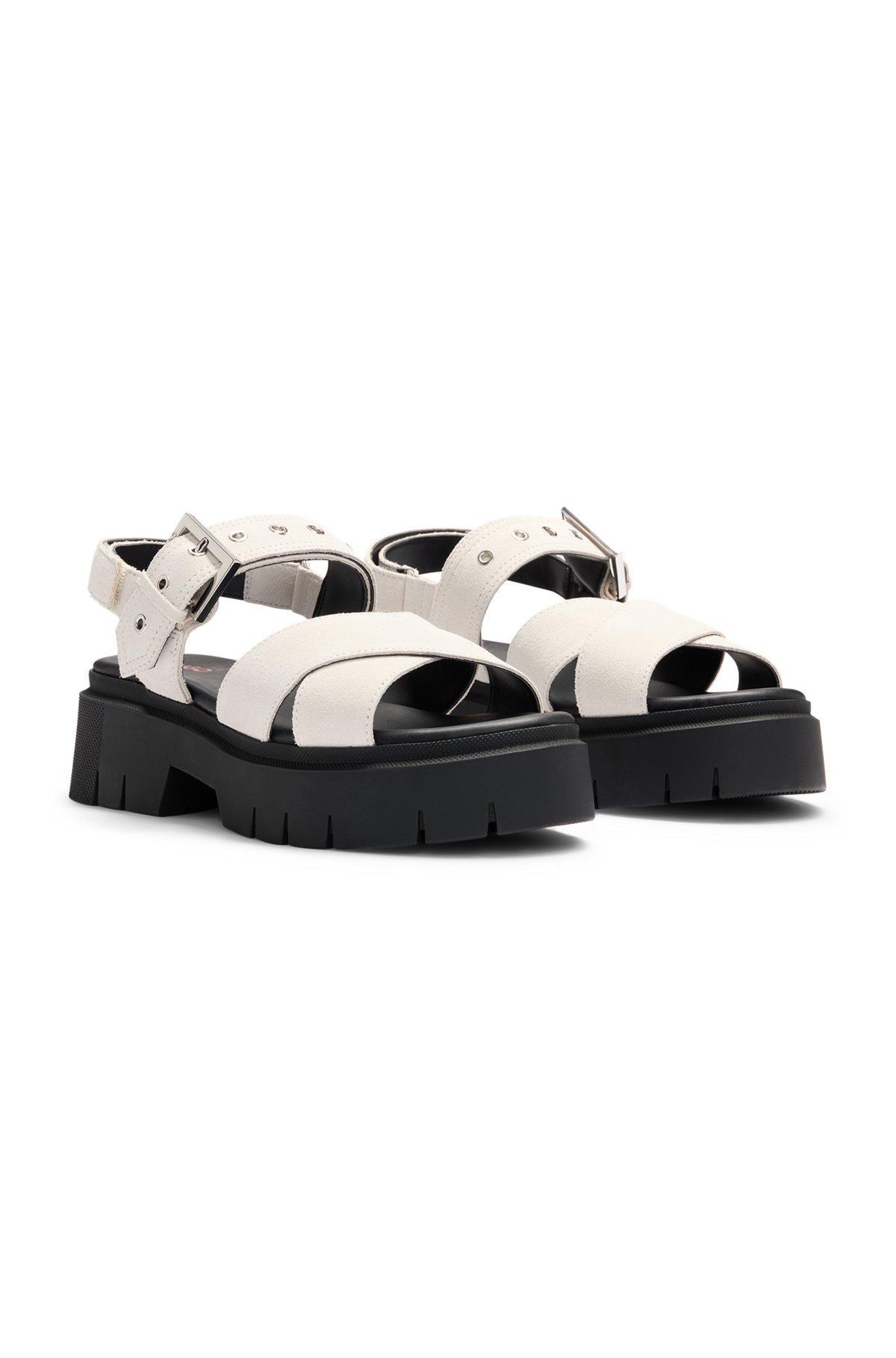 Suede sandals with buckled strap and chunky sole Product Image